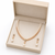 Pearl & pink stone necklace & earrings jewellery set pearl str&, drop earrings, cz centre stone, gold-tone setting.