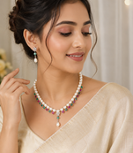 Pearl necklace & earrings set with ruby & emerald stones drop pearl pendant, cz star motif, matching earrings set.