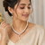 Pearl necklace & earrings set with ruby & emerald stones drop pearl pendant, cz star motif, matching earrings set.