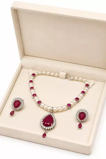 Pearl & ruby stone necklace set with matching earrings teardrop pendant, cz stone accents, pearl str& chain.