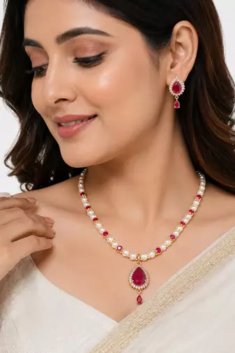 Pearl & ruby stone necklace & earrings jewellery set gold-tone finish,teardrop pendant, bridal wear, white pearl strand.