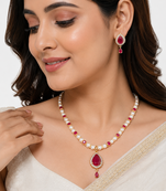 Pearl & ruby stone necklace & earrings jewellery set gold-tone finish,teardrop pendant, bridal wear, white pearl strand.