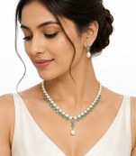 Pearl & emerald green stone necklace and earrings jewellery set drop pearl pendant, matching earrings, bridal wear.