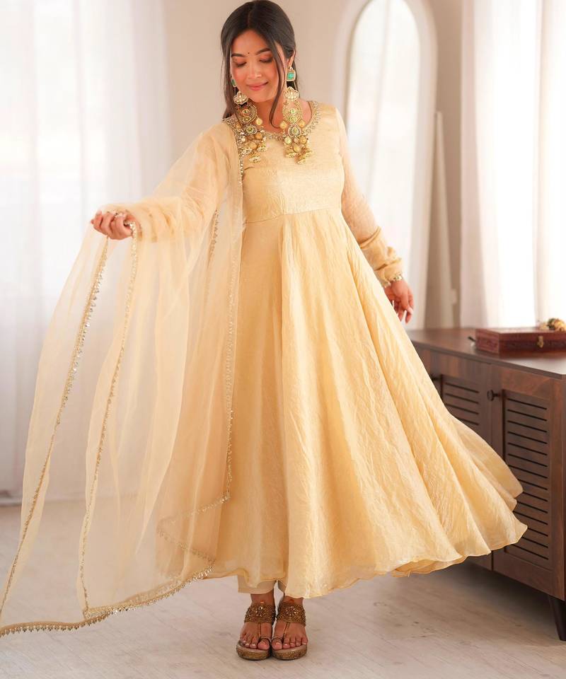 Cream silk blend mirror work flared gown set
