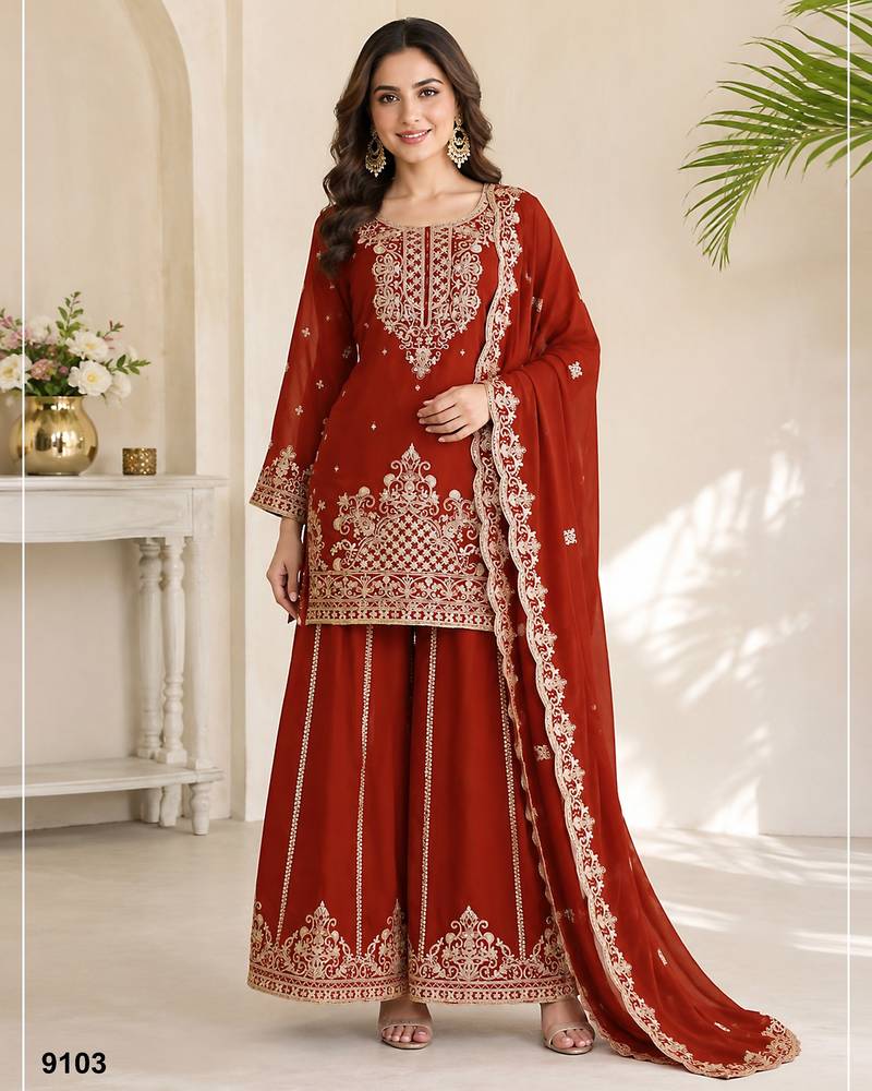 Orange viscose readymade suit with embroidery & sequence work
