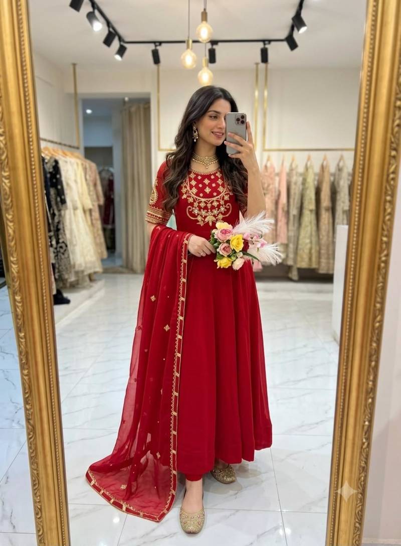 Red faux georgette embroidered flared gown set