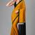 Mustard printed satin saree with blouse