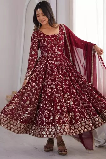 Maroon faux georgette embroidered flared gown set