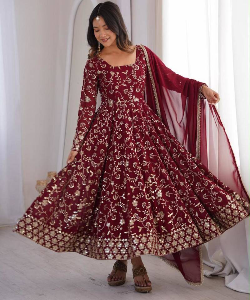 Maroon faux georgette embroidered flared gown set