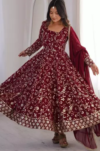 Maroon faux georgette embroidered flared gown set