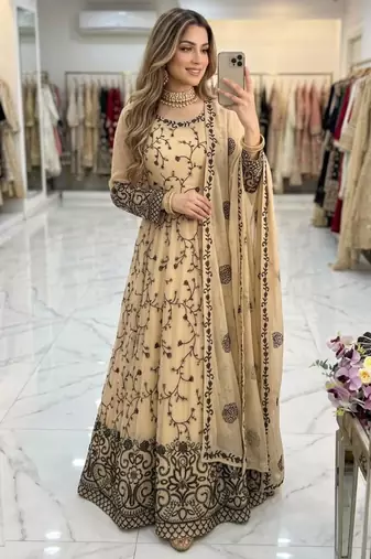 Beige faux georgette embroidered flared gown set