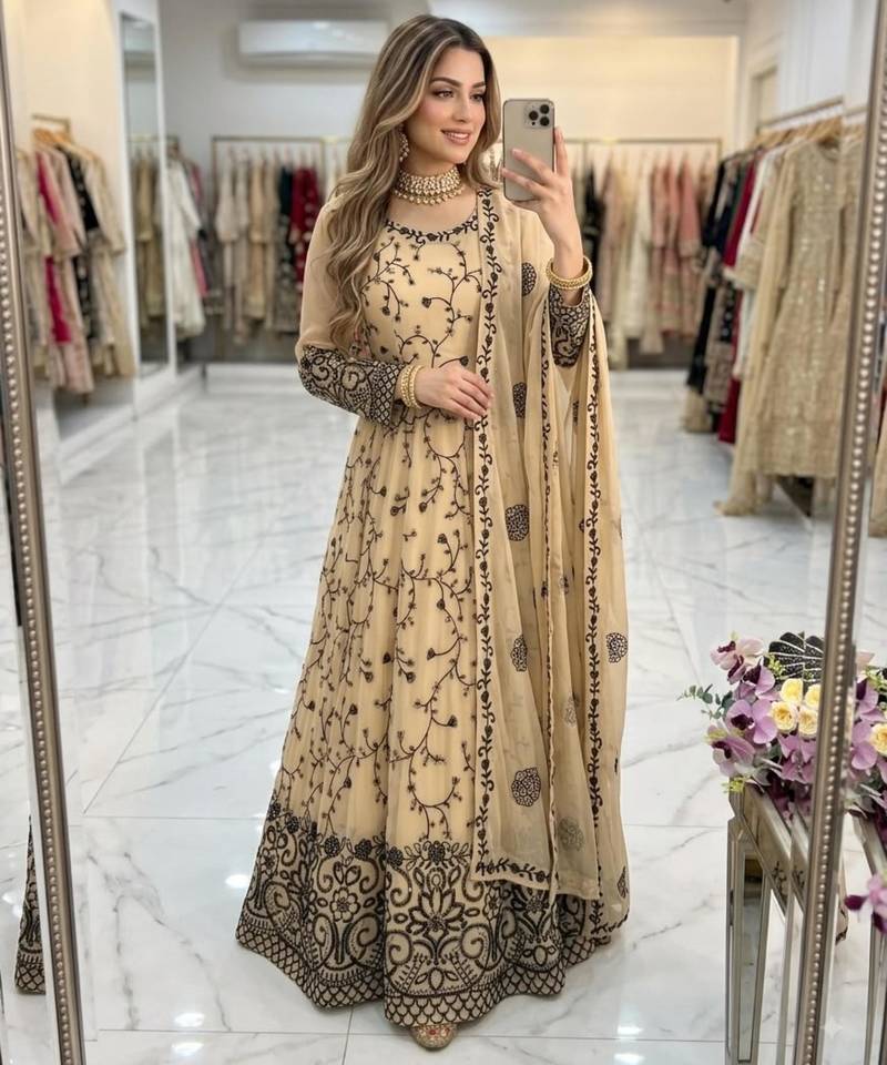 Beige faux georgette embroidered flared gown set