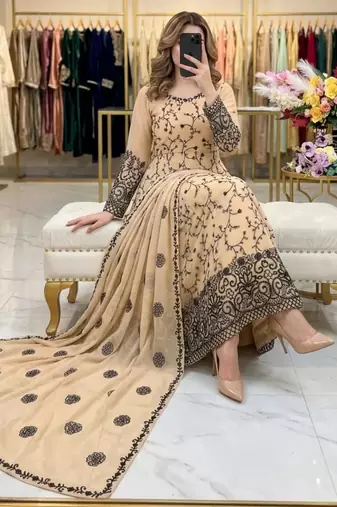 Beige faux georgette embroidered flared gown set