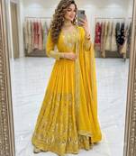 Yellow faux georgette embroidered flared gown set