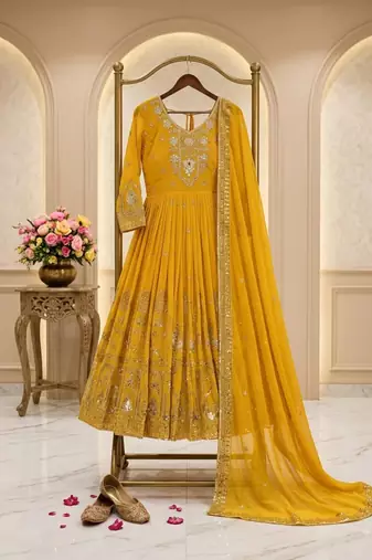 Yellow faux georgette embroidered flared gown set