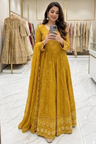 Dark-yellow faux georgette embroidered flared gown set