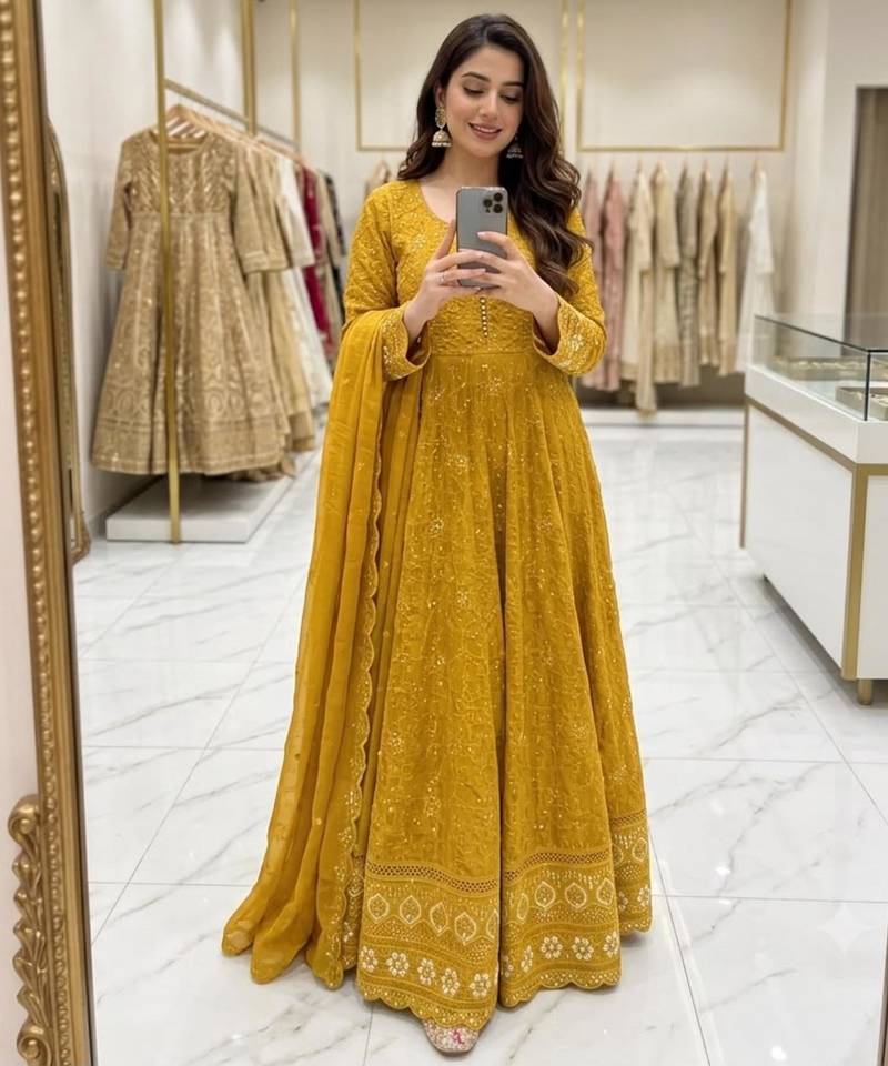 Dark-yellow faux georgette embroidered flared gown set