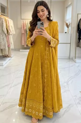 Dark-yellow faux georgette embroidered flared gown set