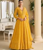 Yellow georgette embroidered flared gown set