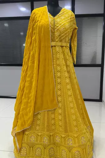 Yellow georgette embroidered flared gown set