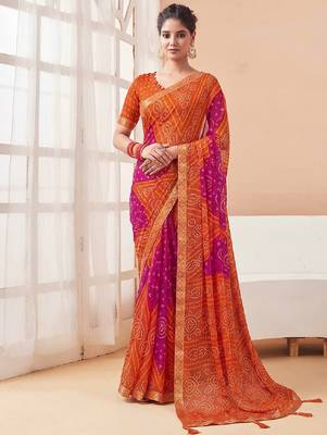 Women's orange bandhani print chiffon bandhej style saree with matching blouse 1