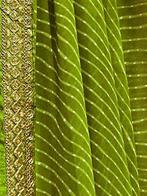 Women's green georgette leheriya print saree with blouse 4