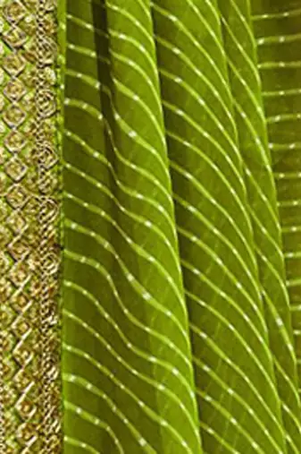 Women's green georgette leheriya print saree with blouse