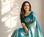 teal color silver zari motif design pattern multi colored digital print silk blend saree