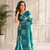 teal color silver zari motif design pattern multi colored digital print silk blend saree