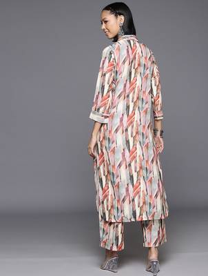 Women Abstract Printed Regular Kurta With Trousers 6