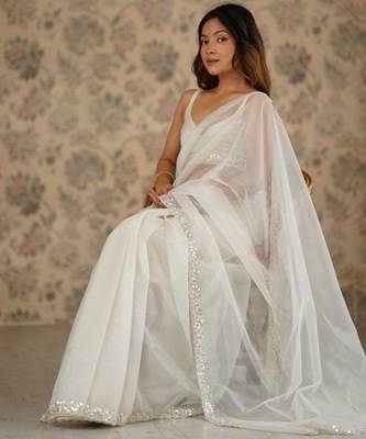 Cream net embellished saree with unstitched blouse piece. 2