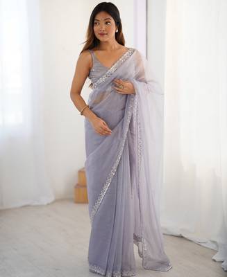 Lilac net embellished saree with unstitched blouse piece. 3