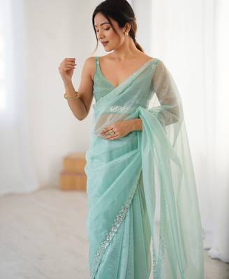 Mint net embellished saree with unstitched blouse piece. 1