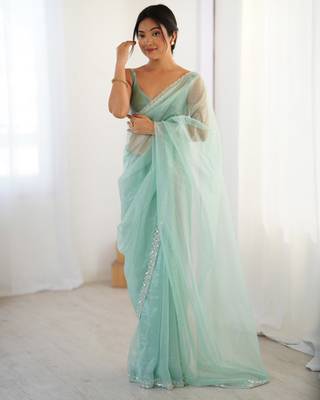 Mint net embellished saree with unstitched blouse piece. 3