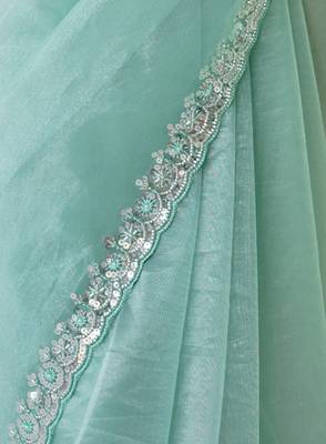 Mint net embellished saree with unstitched blouse piece. 4