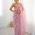 Pink net embellished saree with unstitched blouse piece.