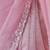 Pink net embellished saree with unstitched blouse piece.
