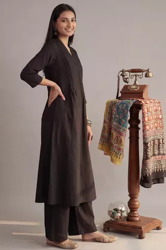 black solid a-line design features pintuck pleats kurta palazzo set