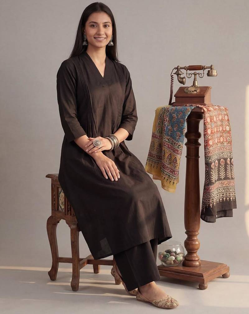 black solid a-line design features pintuck pleats kurta palazzo set