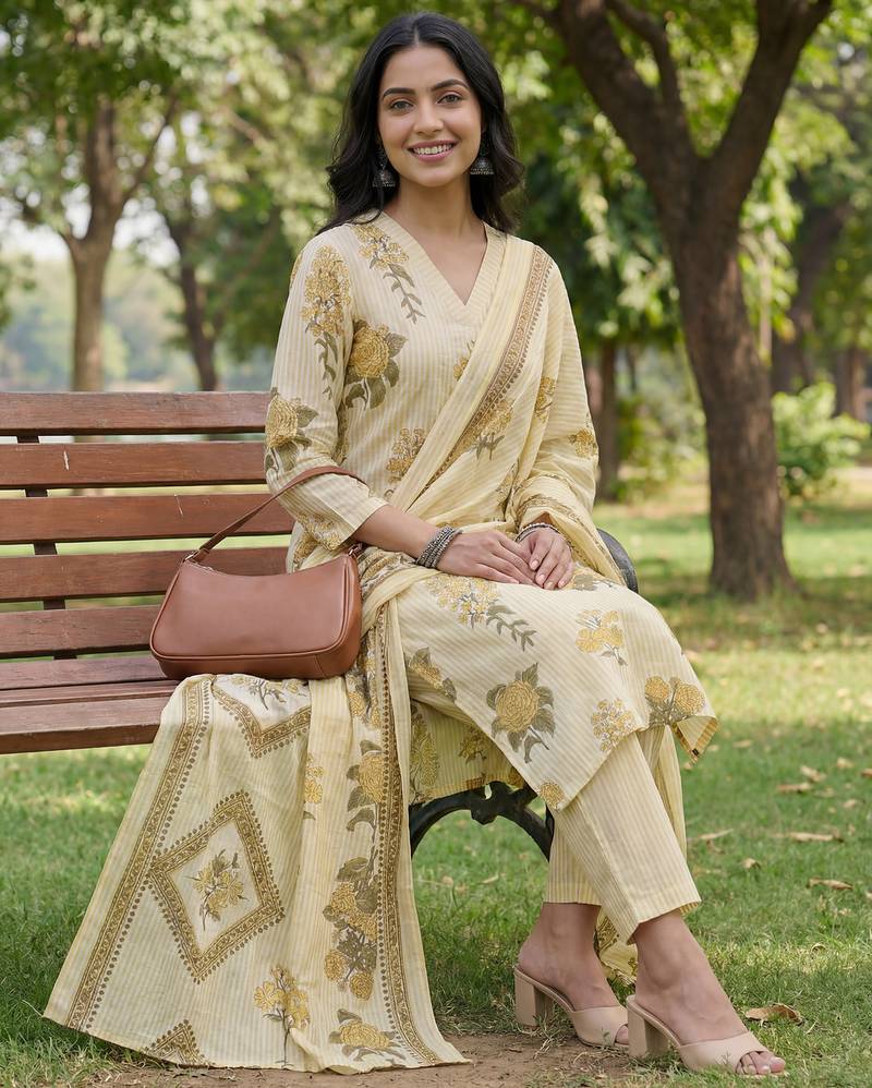 yellow straight design striped and floral print with this kurta trouser dupatta set