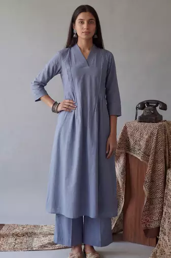 blue solid a-line design features pintuck pleats kurta palazzo set