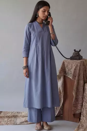 blue solid a-line design features pintuck pleats kurta palazzo set