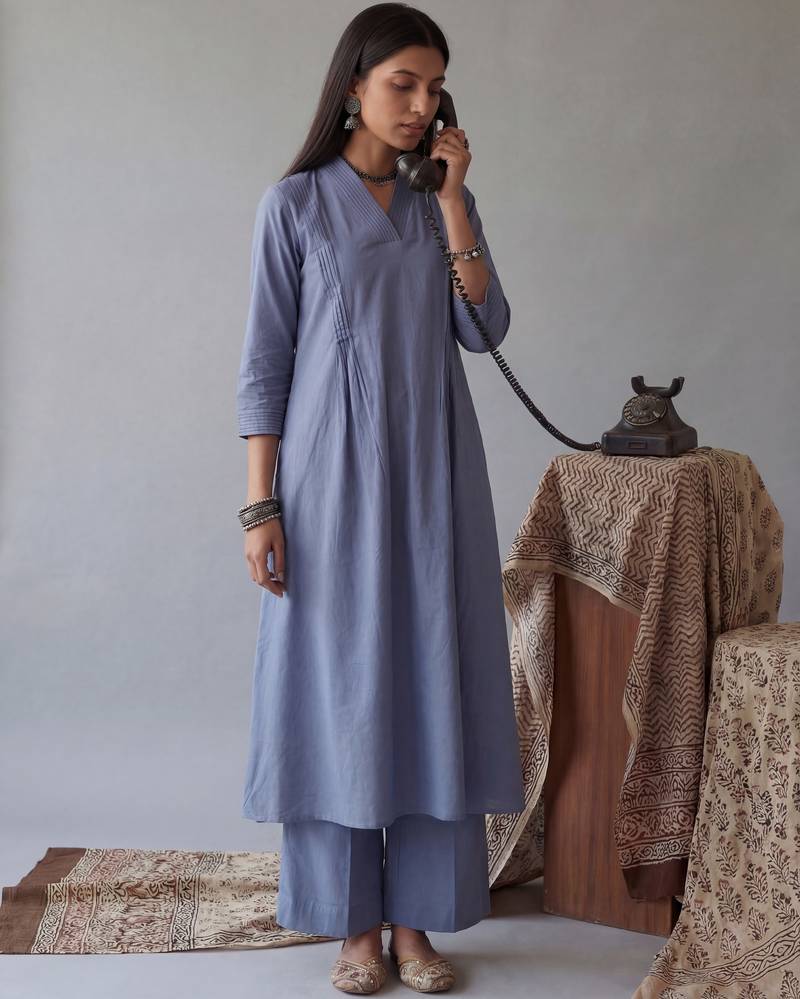 blue solid a-line design features pintuck pleats kurta palazzo set