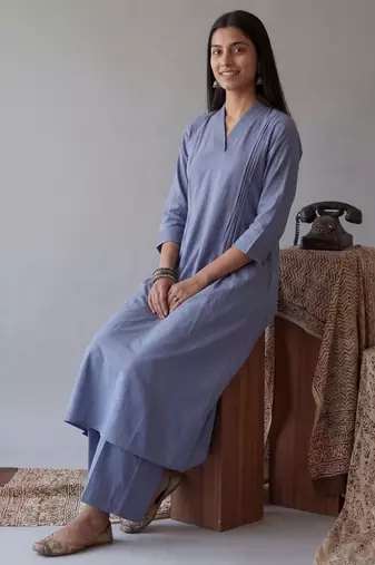 blue solid a-line design features pintuck pleats kurta palazzo set