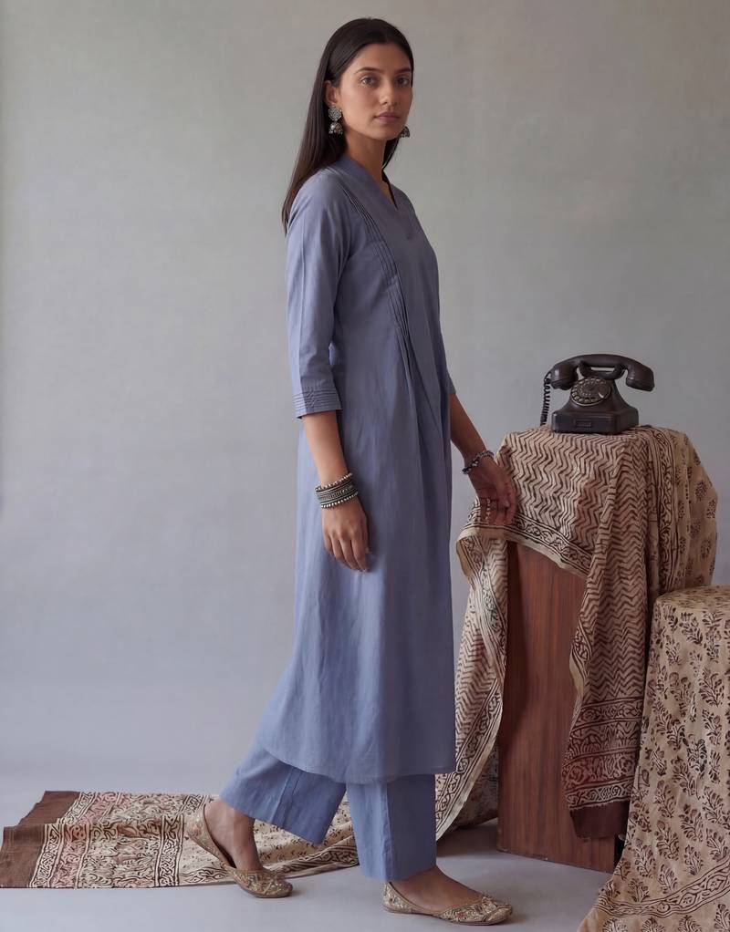 blue solid a-line design features pintuck pleats kurta palazzo set