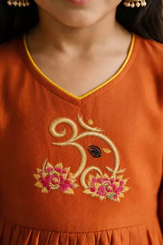 Girls orange embroidered kurta with trousers & dupatta