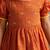 Sishu girls orange floral embroidered kurta with dhoti pant