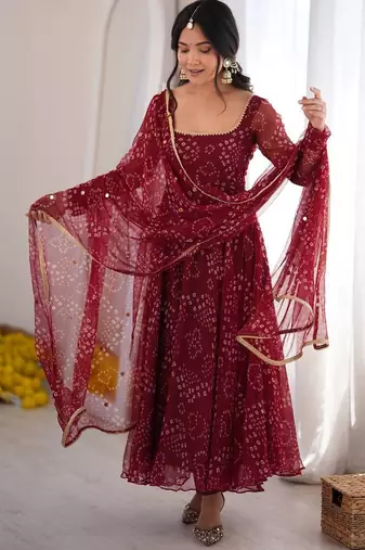 Women maroon bandhani print anarkali kurta with pent & dupatta
