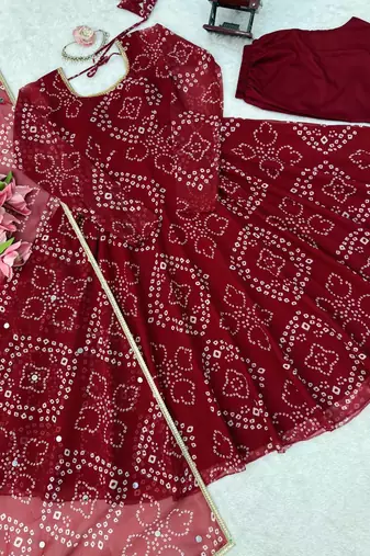 Women maroon bandhani print anarkali kurta with pent & dupatta