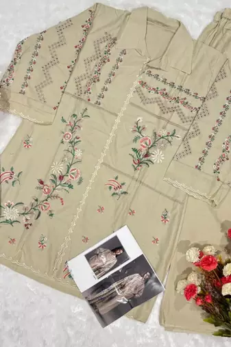 Cream cotton readymade suit with thread embroidery work